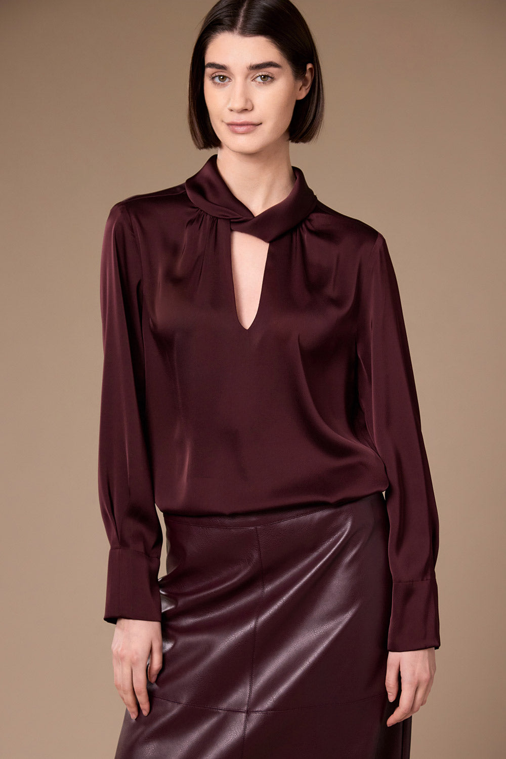 Peruzzi Twist Neck Blouse